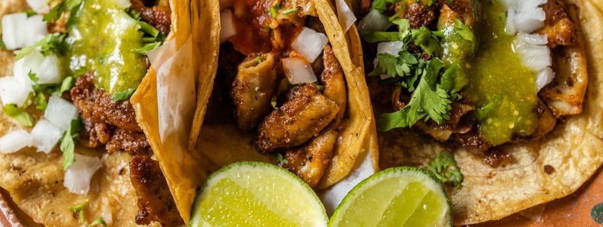 Corporate catering selection featuring quesadillas, tacos and burritos